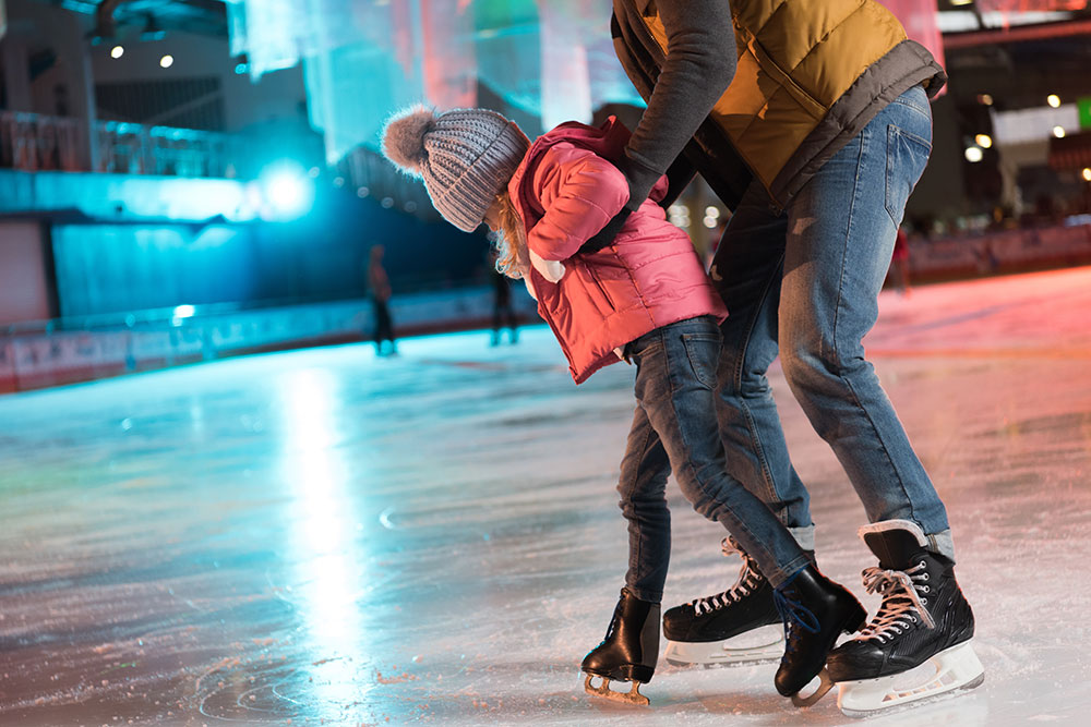 Guests On Synthetic Ice Skating Rink