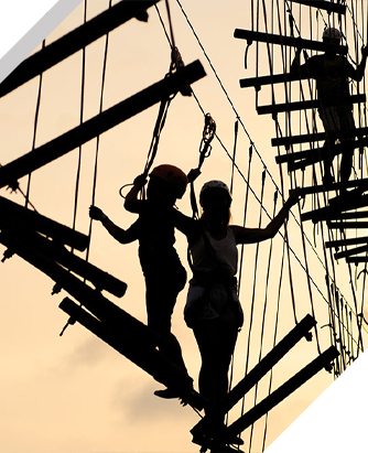 Silhouettes of Guests On Ropes Course